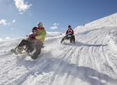 Tobogganing with family in the Family & Children's Hotel South Tyrol - Hotel Watles directly at the Skigebitd